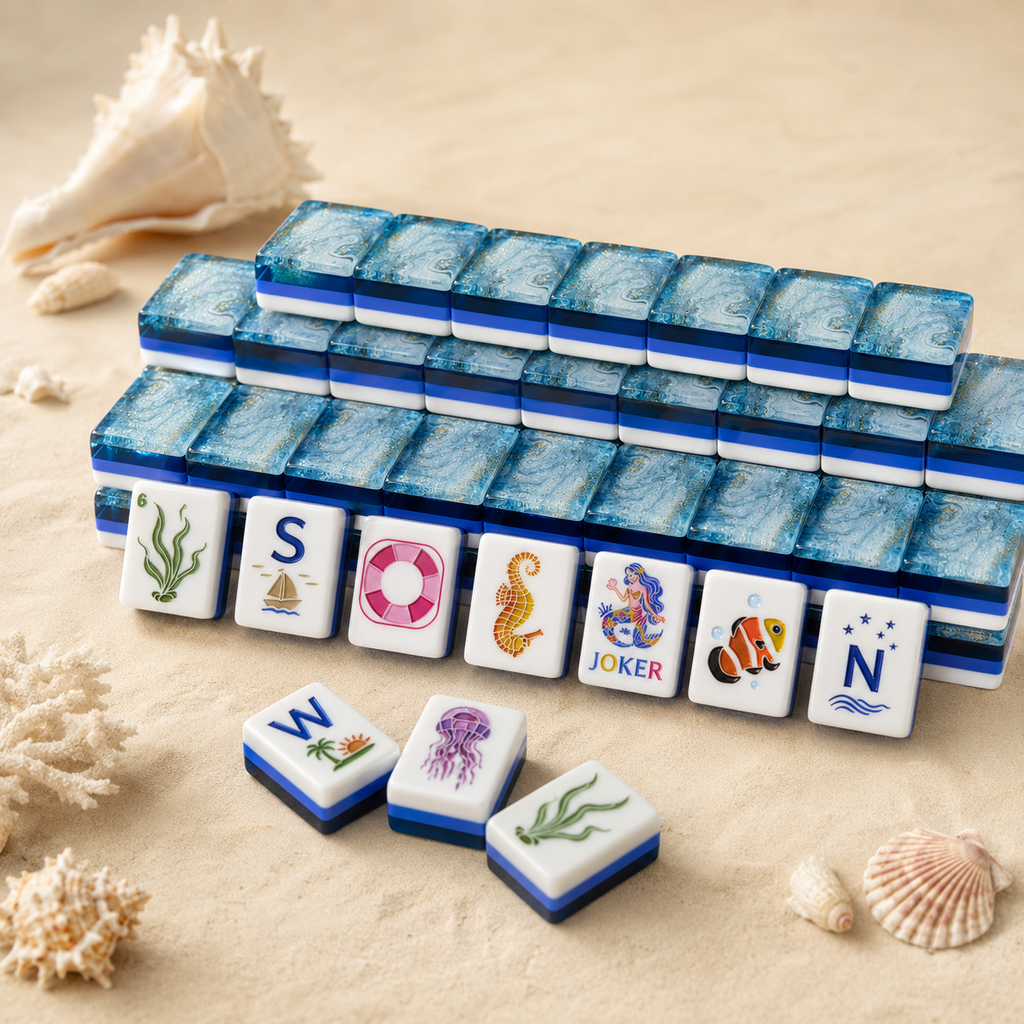 Stacked wall of blue marbled mahjong tiles with seaweed, Joker, seahorse, clownfish, and wind tiles displayed in front.