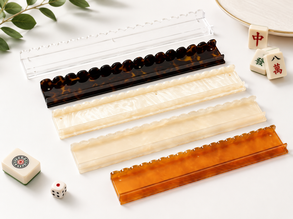 Five acrylic American mahjong tile racks in clear, tortoiseshell, shell, pearl beige, and amber finishes