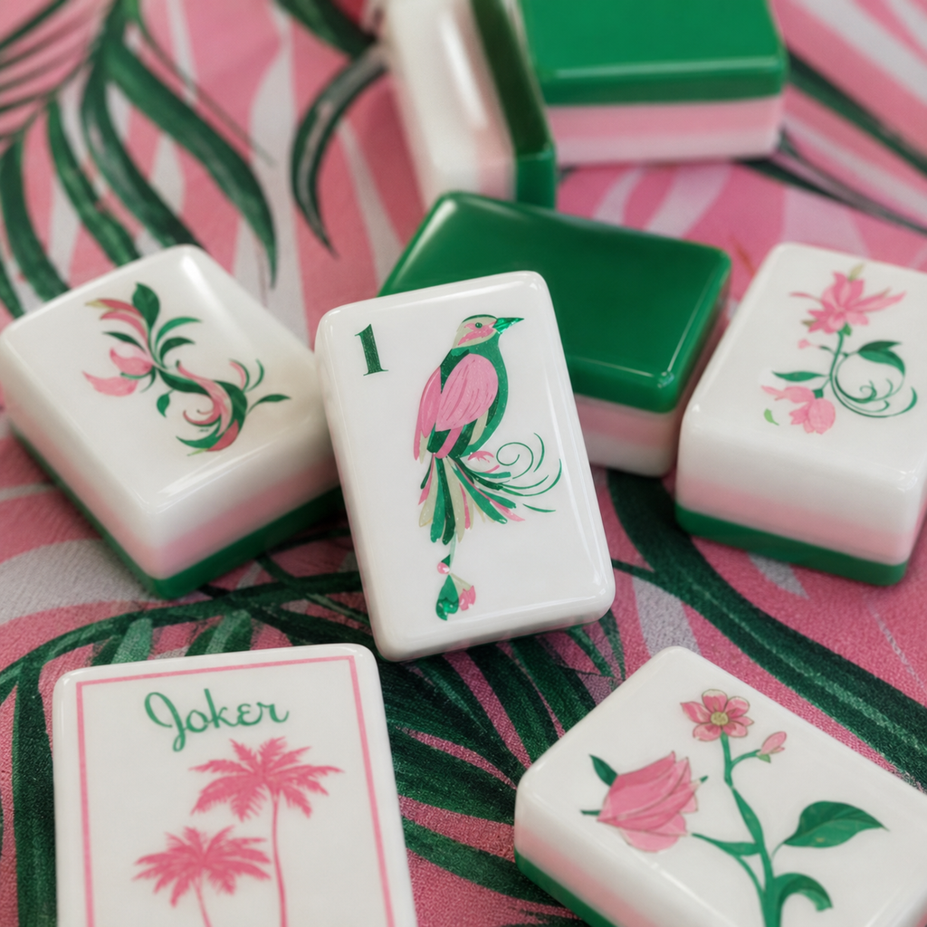 Pink and green tropical mahjong set with bird, shell, bamboo, and floral tile artwork