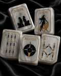 Celestial Pearl American Mahjong tiles with black and gold designs on black satin