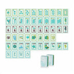 Luxury beach-inspired mahjong tiles with glossy finish and tropical illustrations