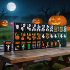 Black Halloween mahjong set displayed outdoors with pumpkins, a full moon and a spooky nighttime background.