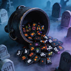 Halloween mahjong tiles spilling from a black witch cauldron in a foggy graveyard with tombstones.