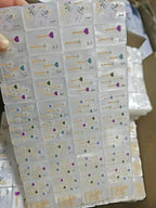 Close-up of Jewel Pearl Mahjong tiles with gemstone-inspired floral artwork
