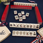 Red white and blue American Mahjong tiles with stars, fireworks, and eagle artwork