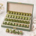 Vintage garden-inspired American Mahjong set displayed with matching tiles